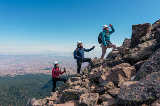 Three climbers on a mountain side